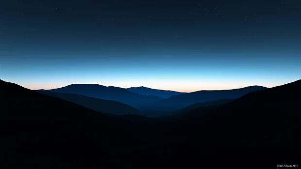Deep blue sky with subtle gradients to soft white horizon.