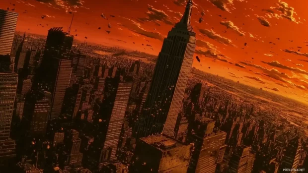 Golden orange sky over iconic New York City skyline with Empire State Building at sunset.