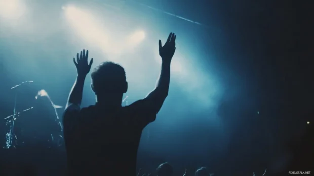 HD concert stage lights wallpaper, Silhouettes of hands clapping at music festival.
