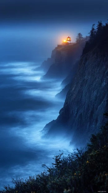 Illuminated mist shaped by coastal Light.