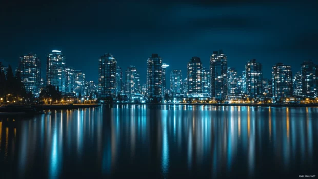 In the stillness of night, the dark city pulses with silent life.