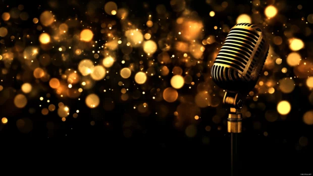 Microphone on stand with background bokeh of music lights.