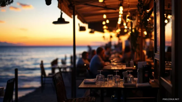 Outdoor beachside dining with ocean view and relaxed atmosphere .
