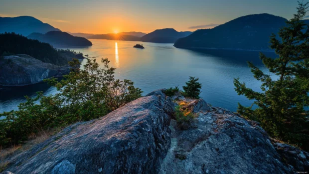 Rocky coastline catches the first light in this Sunrise Wallpaper for Desktop.