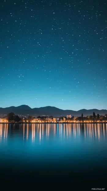 Stars shining brightly peaceful night sky city skyline faint glow urban lights.