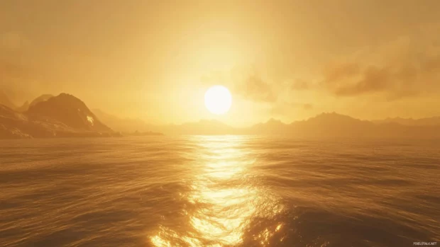 Still ocean surface beneath a golden sunrise sky.