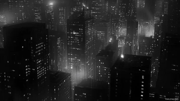 Subtle light streaks across buildings in a black and white city wallpaper scene.