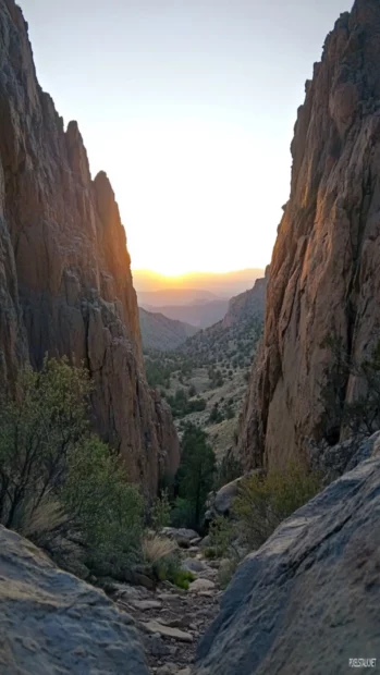 Sunrise peeking through the valley horizon.