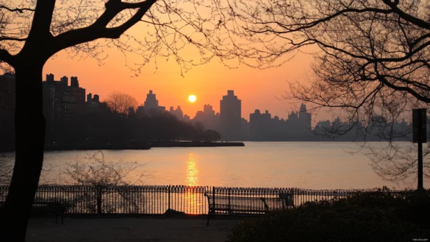 Timeless charm of Manhattan featured in New York City Desktop Wallpaper with soft sunset hues.