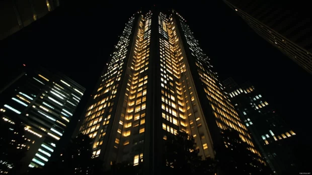 Towering buildings shimmer in the heart of Tokyo Cityscape at night.