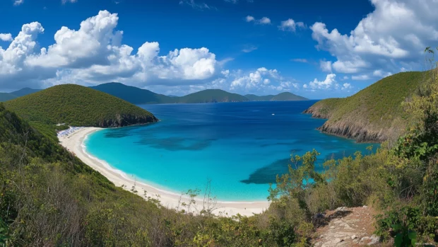 Turquoise waters and white sand on a pristine beach.