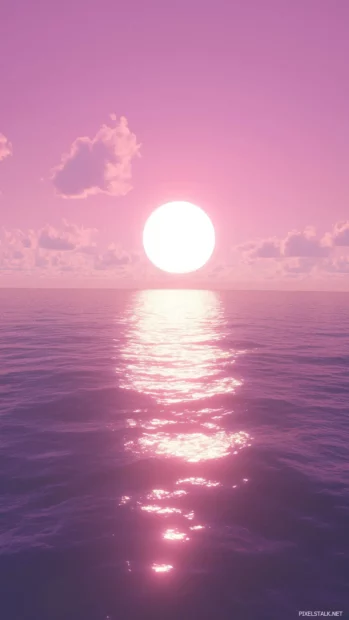 Vibrant pink purple sky reflects on tranquil ocean, last sun rays fade.