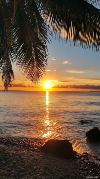 sunrise over ocean wallpaper as seen from a quiet beach.
