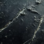 A Broken Screen showing detailed cracks and smudges on desktop display.