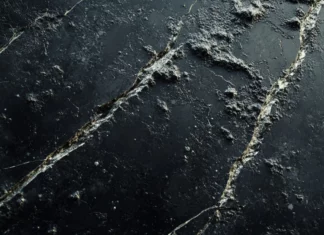 A Broken Screen showing detailed cracks and smudges on desktop display.