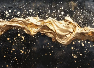 A cascade of golden sparks flowing across a black surface.