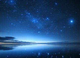 A celestial dream Beautiful blue stars sky wallpaper, with stars spilling across the deep space horizon.