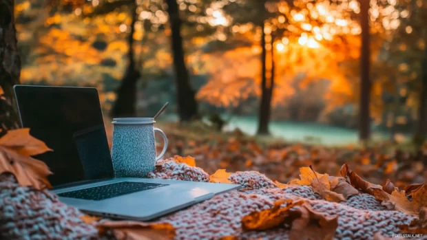 A cozy autumn landscape glowing softly during golden hour, Cute pretty background for laptop.
