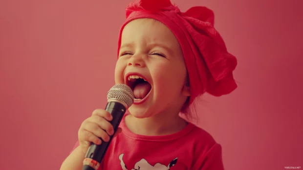 A cute girl with a happy expression and a microphone, singing her favorite song with passion and enthusiasm.