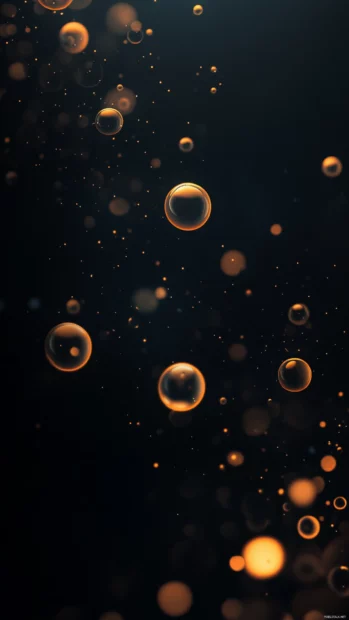 A deep black background with soft glowing orbs floating gently across the lock screen.
