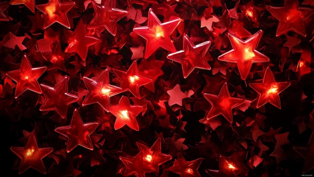 A dramatic night sky filled with bold red stars twinkling against a dark velvet background, creating a striking contrast that captivates the eye.