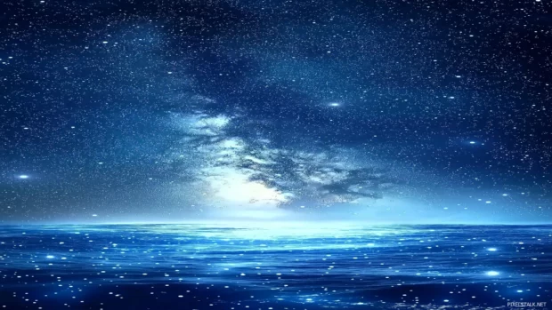 A mesmerizing starry sky filled with twinkling stars and a prominent Milky Way stretching across the dark blue expanse, creating a sense of wonder and tranquility.