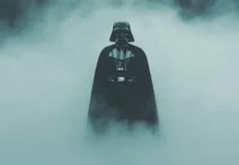 A moody depiction of Darth Vader standing in the mist, ideal for those seeking cinematic Star Wars backgrounds.