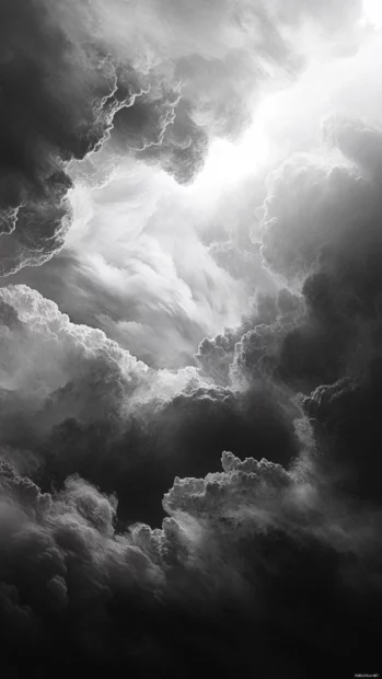 Abstract cloud textures blend into fading sunlight across the lock screen, creating a dreamy fade.