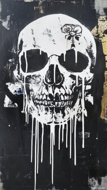 Abstract skull dripping white paint from rooftop graffiti.