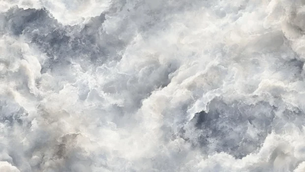 Abstract watercolor clouds wallpaper with swirling white and gray shapes.