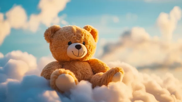 Adorable kawaii style teddy bear sitting on a fluffy cloud.