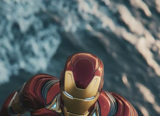 Aerial view of Iron Man flying over the ocean.