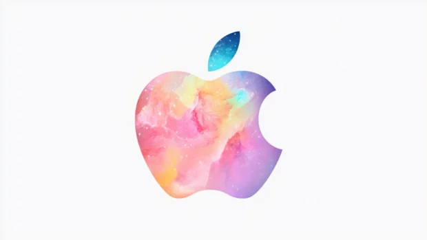 An Apple logo surrounded by colorful galaxies and stars shining brightly.