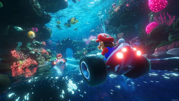 An underwater race with Mario and Toad gliding through glowing coral caves in Mario Kart.