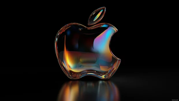 Apple Desktop Wallpaper smooth glassy Apple logo design reflecting Mac style.