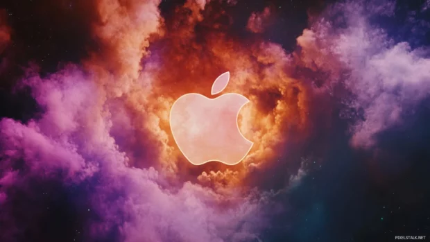 Apple logo surrounded by colorful fog in a dreamy outer space scene.
