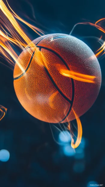 Basketball in mid air captured with motion blur and glowing trails.