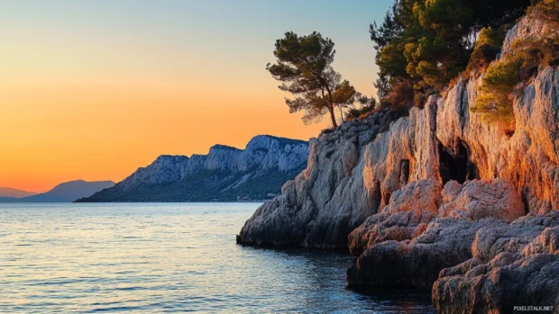 Beautifull coastal cliffs shining in sunset glow.