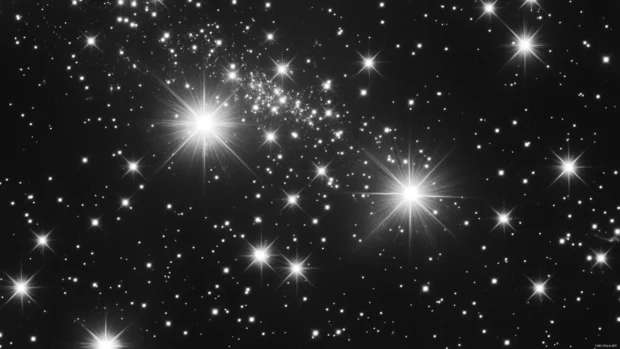 Black Starry Wallpaper featuring stars glittering faintly across the void.