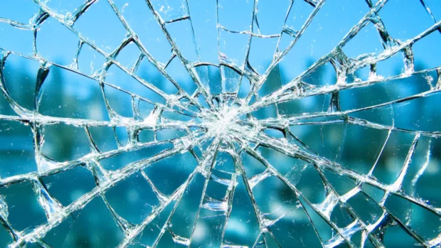 Broken Screen wallpaper shattered glass illusion desktop style.