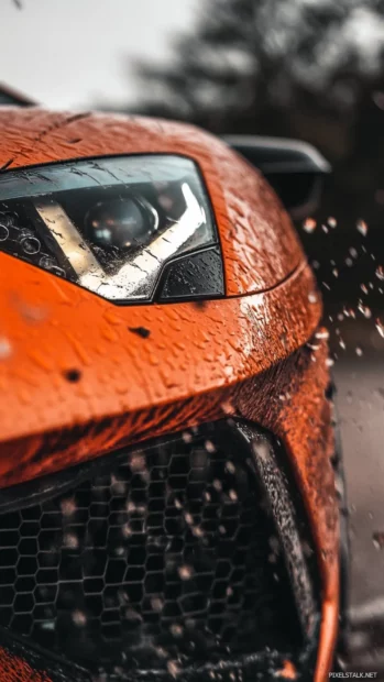 Close up Lamborghini Aventador wallpaper focused on the front grille and sharp headlamps.