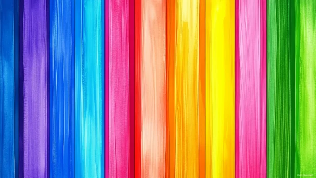 Colorful rainbow watercolor background with a spectrum of vibrant colors.