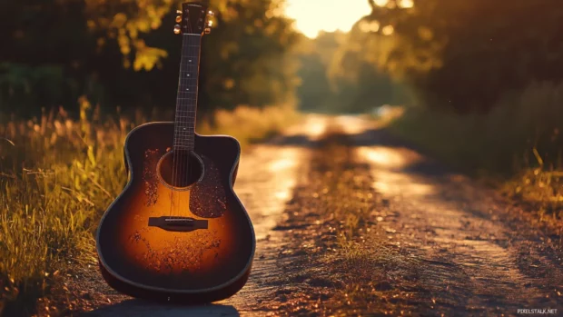 Country music vibes radiating from a glowing speaker captured in Country road guitar scene wallpaper.