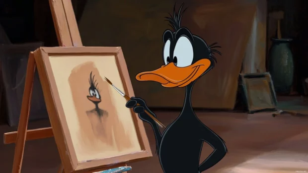 Daffy Duck paints a self portrait that looks completely ridiculous in front of a canvas.