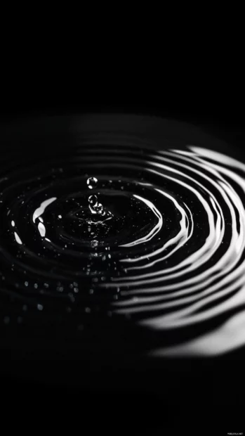 Delicate ripples of water shimmer faintly on a black lock screen background.