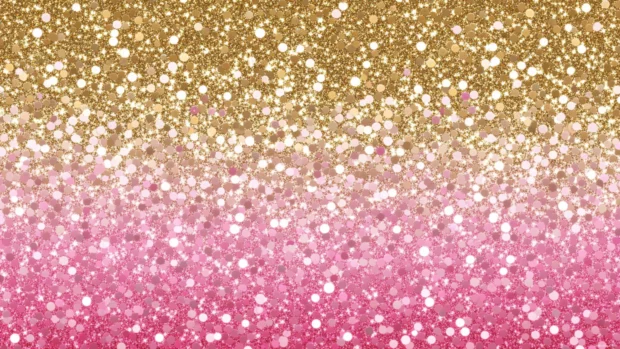 Elegant gold and pink glitter background with soft lighting.