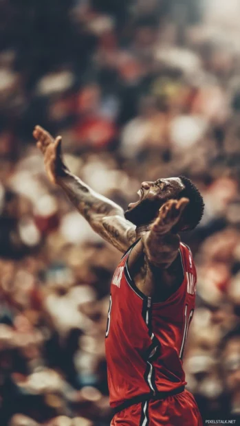 Epic basketball player celebration, crowd in blur, emphasizing focus on the athletes raw emotion.