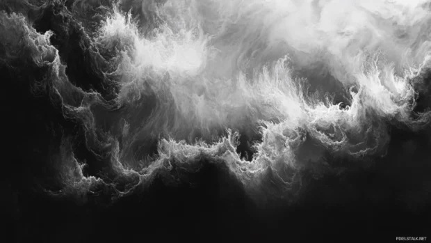 Fluid paint waves blending and shifting across the screen.