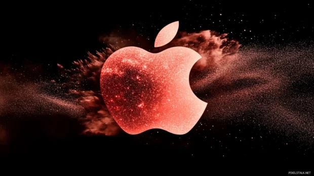 Glowing Apple logo surrounded by cosmic dust in dark themed wallpaper.