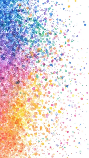 Happy rainbow sprinkles scattered over a white backdrop.